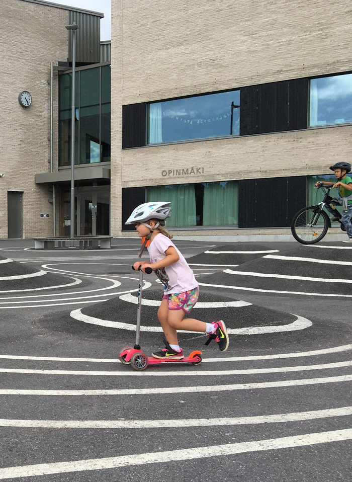 Opinmäki playing kids biking